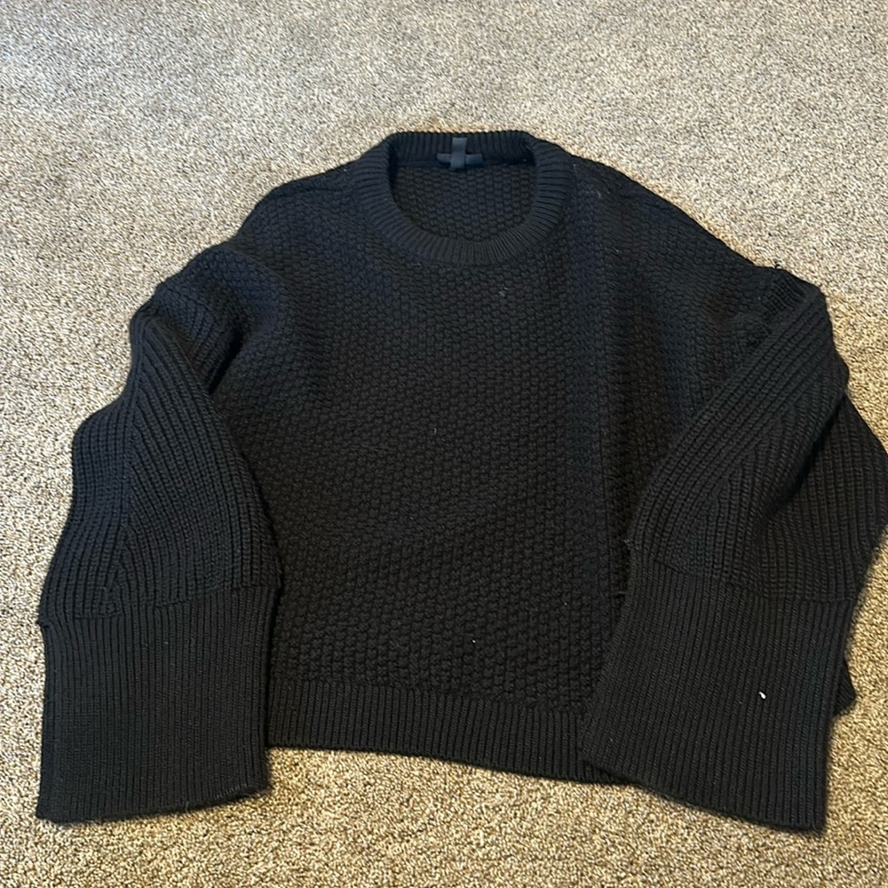 TOPSHOP black sweater! Size 12. Darling sleeve. Has a couple of spots. See pics.